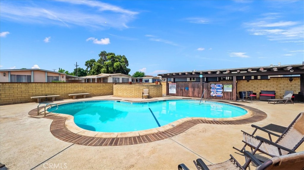 416 Jeffries, Unit 5 Monrovia, CA 91016 - Photo 20 of 20 a view of a swimming pool with a yard