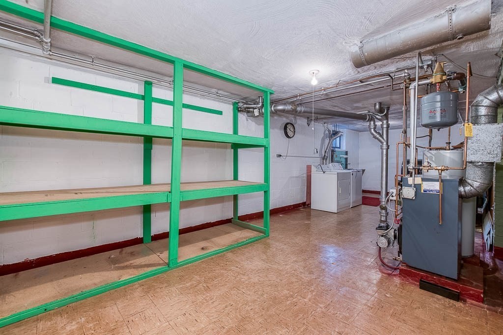 12 Juniper Terrace Dedham, MA 02026 - Photo 34 of 41 a room with lots of white furniture and a window