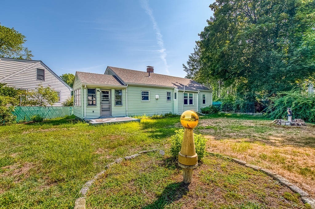 12 Juniper Terrace Dedham, MA 02026 - Photo 38 of 41 a view of a house with pool and a yard
