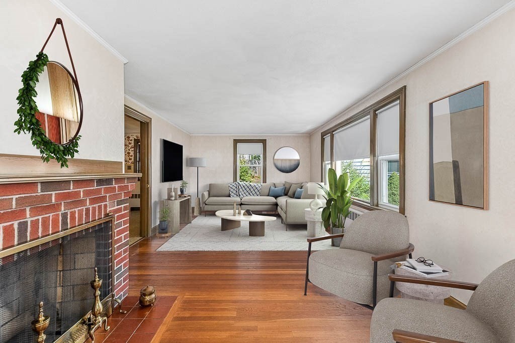 12 Juniper Terrace Dedham, MA 02026 - Photo 5 of 41 a living room with furniture and a flat screen tv