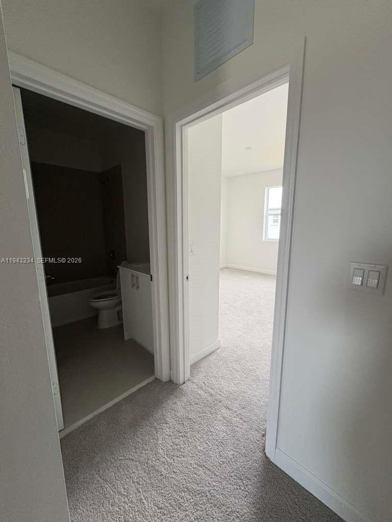 35663 Southwest 178th Court Homestead, FL 33034 - Photo 13 of 23 wooden floor and closet in a room