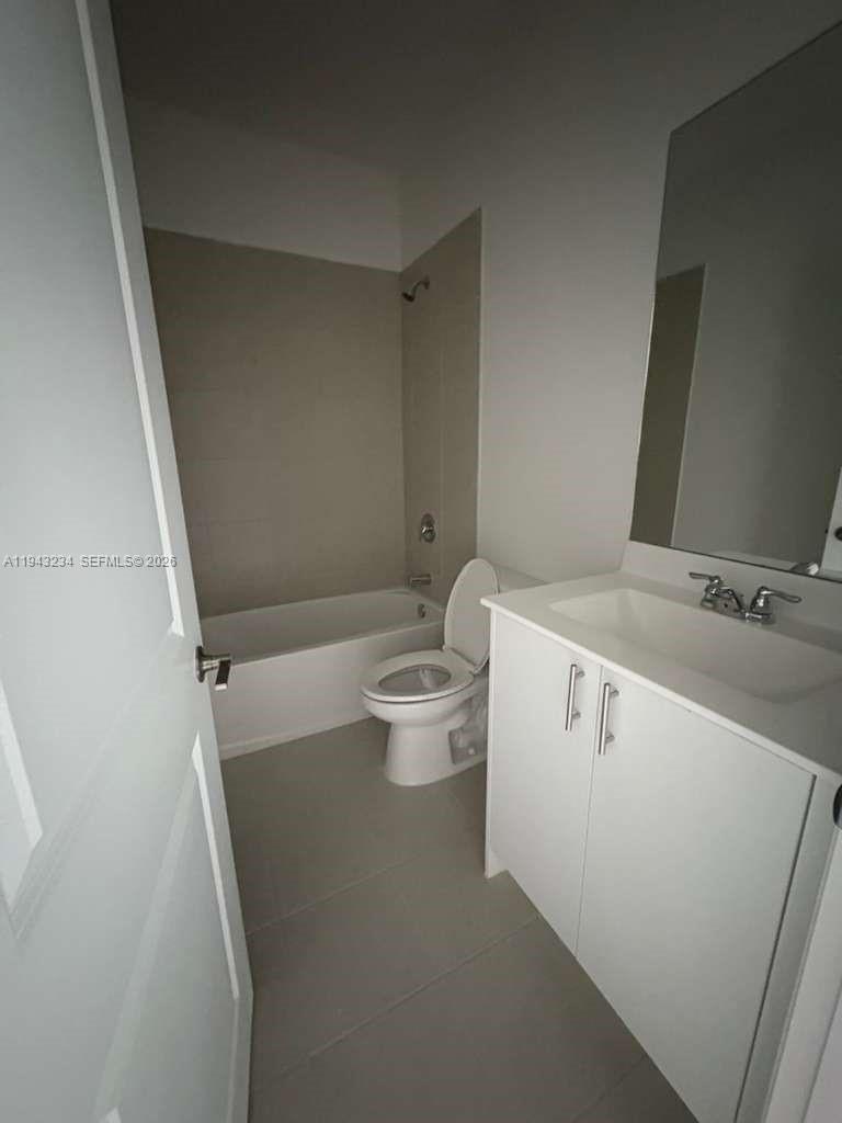 35663 Southwest 178th Court Homestead, FL 33034 - Photo 14 of 23 a close view of vanity and a tap