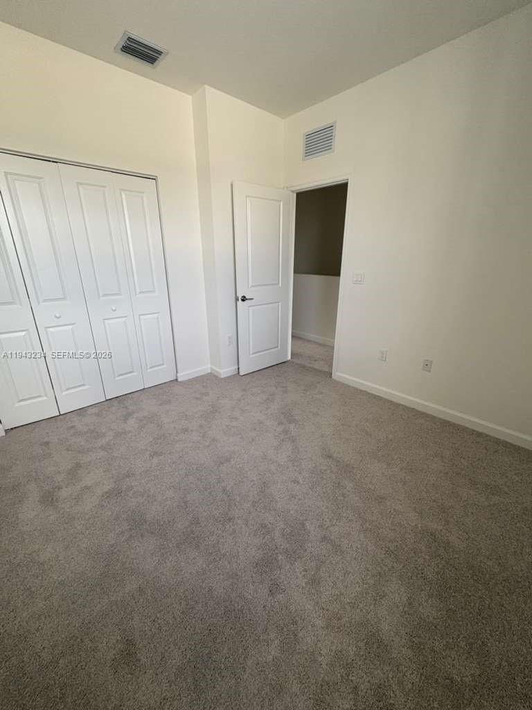35663 Southwest 178th Court Homestead, FL 33034 - Photo 18 of 23 a view of an empty room