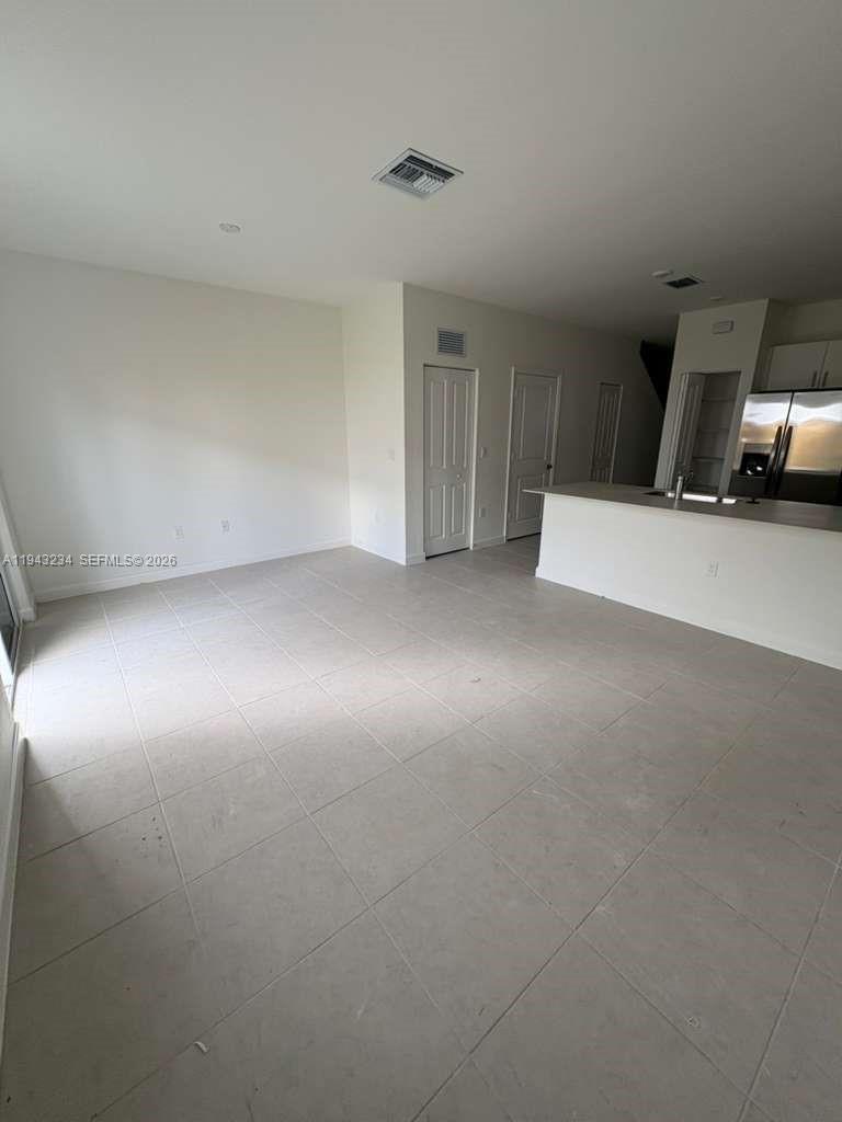 35663 Southwest 178th Court Homestead, FL 33034 - Photo 5 of 23 a view of a livingroom with furniture and a window
