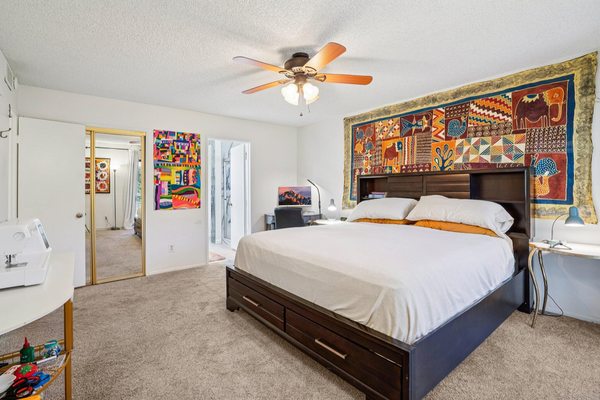 3155 Ramon Road, Unit 311 Palm Springs, CA 92264 - Photo 11 of 29 a bed sitting in a bedroom next to a window
