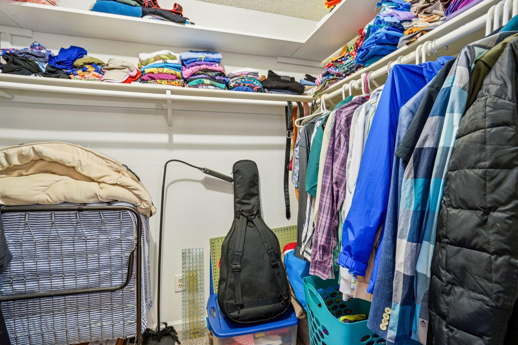 3155 Ramon Road, Unit 311 Palm Springs, CA 92264 - Photo 14 of 29 a view of walk in closet with clothes and shoes