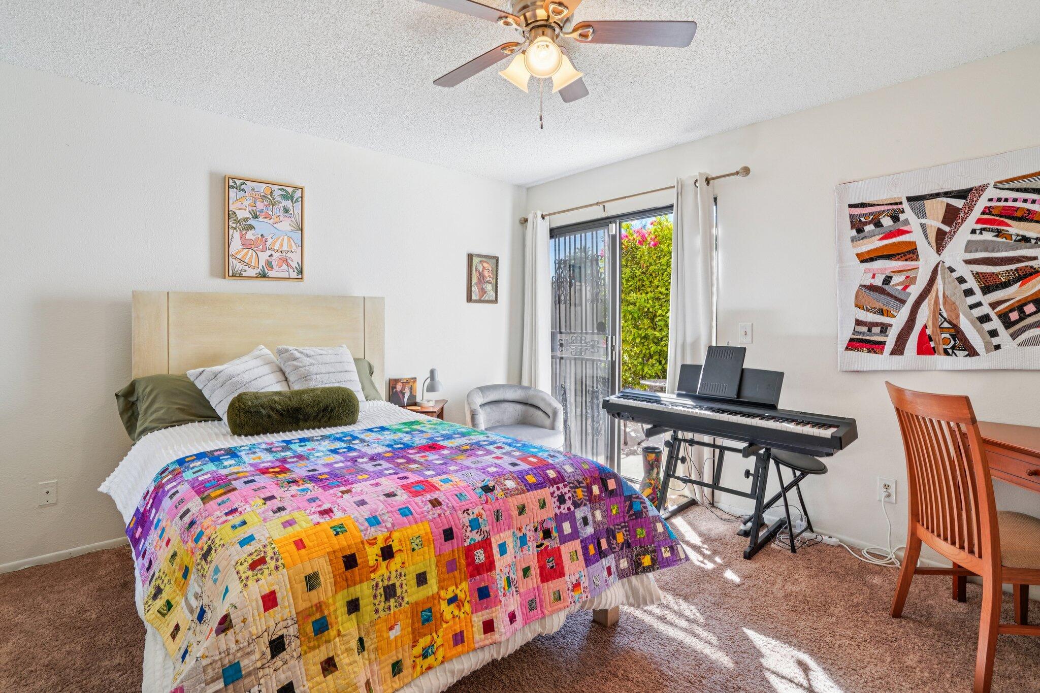 3155 Ramon Road, Unit 311 Palm Springs, CA 92264 - Photo 20 of 29 a bedroom with bed and a window