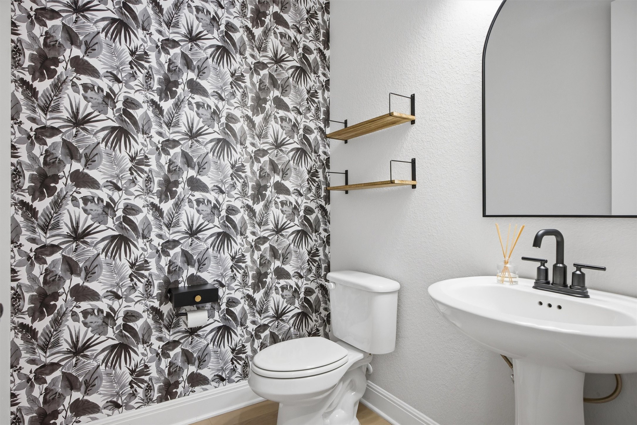 208 Tovas Secret Cove Georgetown, TX 78628 - Photo 10 of 40 a bathroom with a sink toilet and mirror