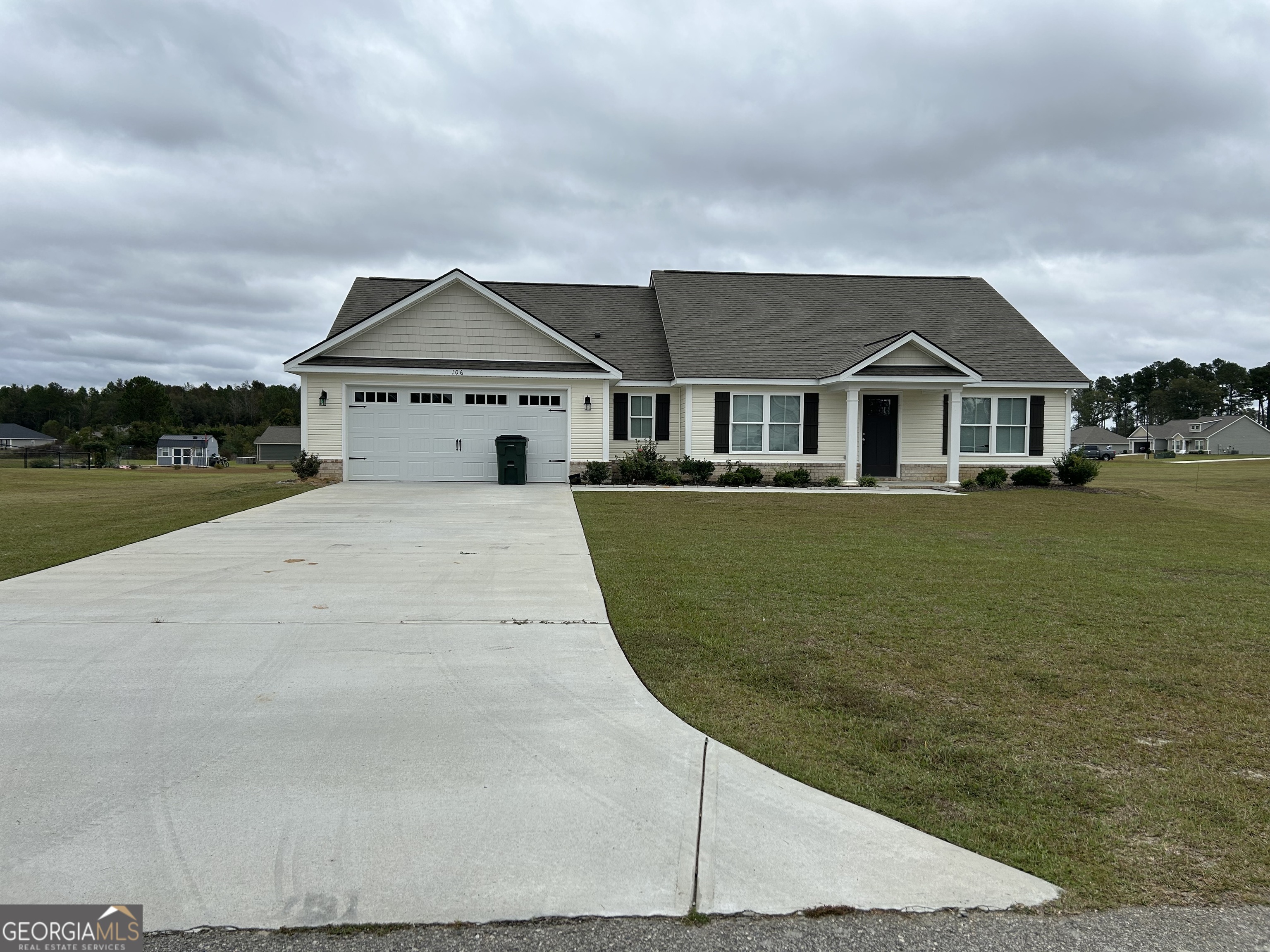 106 Old Barn Road Statesboro, GA 30458 - Photo 1 of 59 a front view of a house with a yard