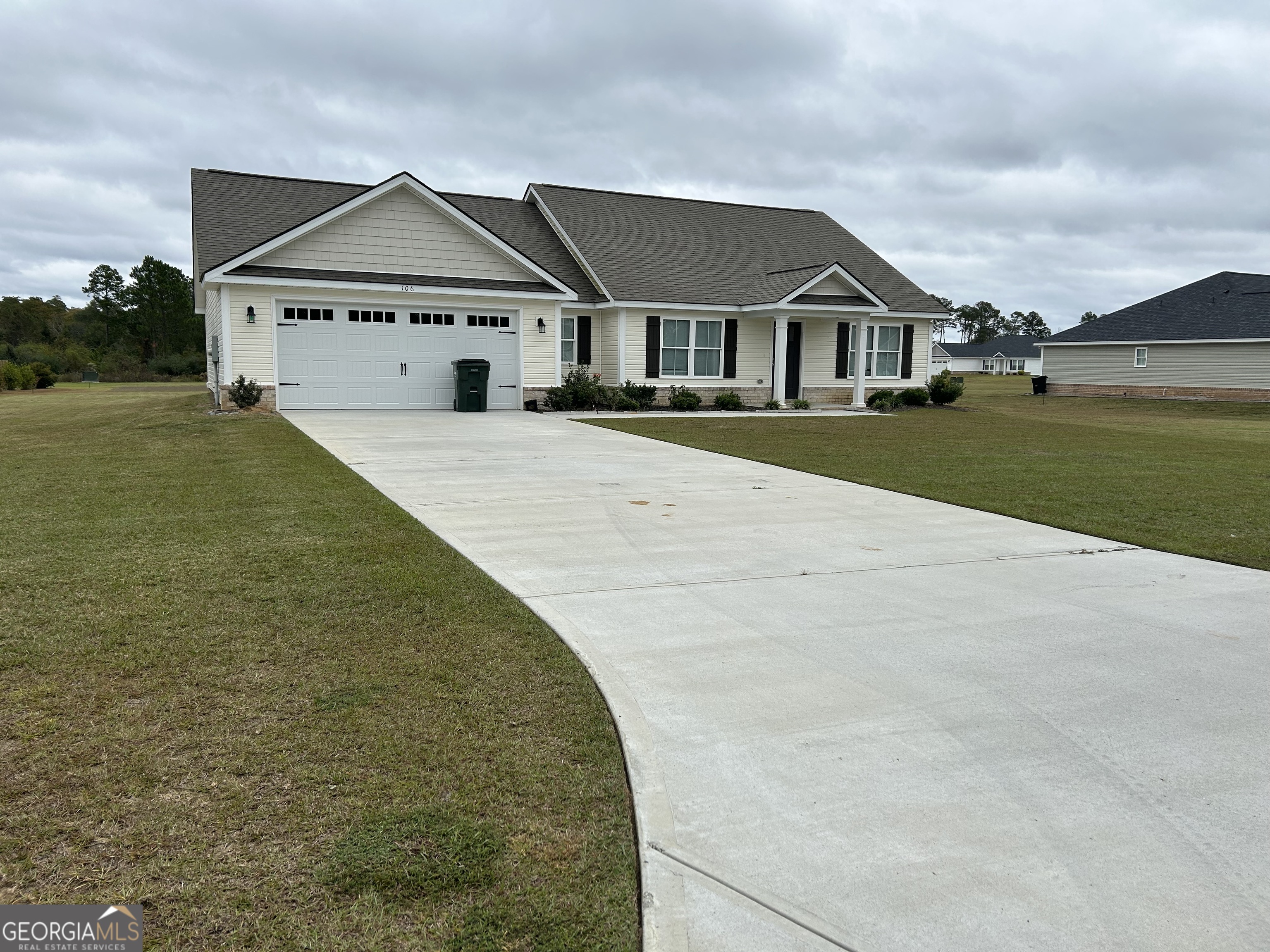 106 Old Barn Road Statesboro, GA 30458 - Photo 2 of 59 a front view of a house with a yard
