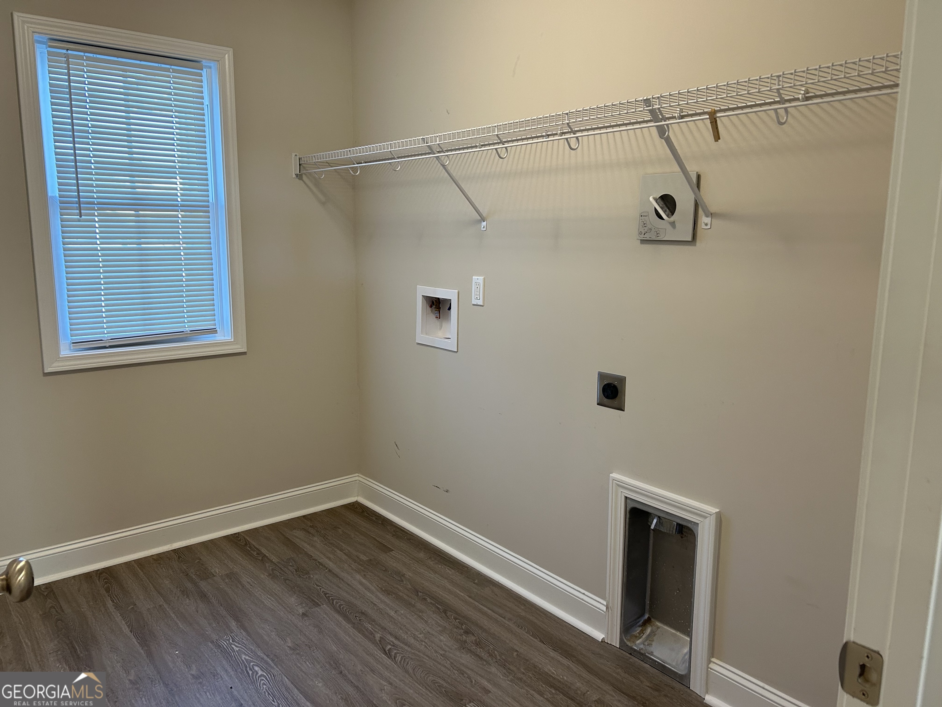 106 Old Barn Road Statesboro, GA 30458 - Photo 24 of 59 a view of a room with wooden floor and windows
