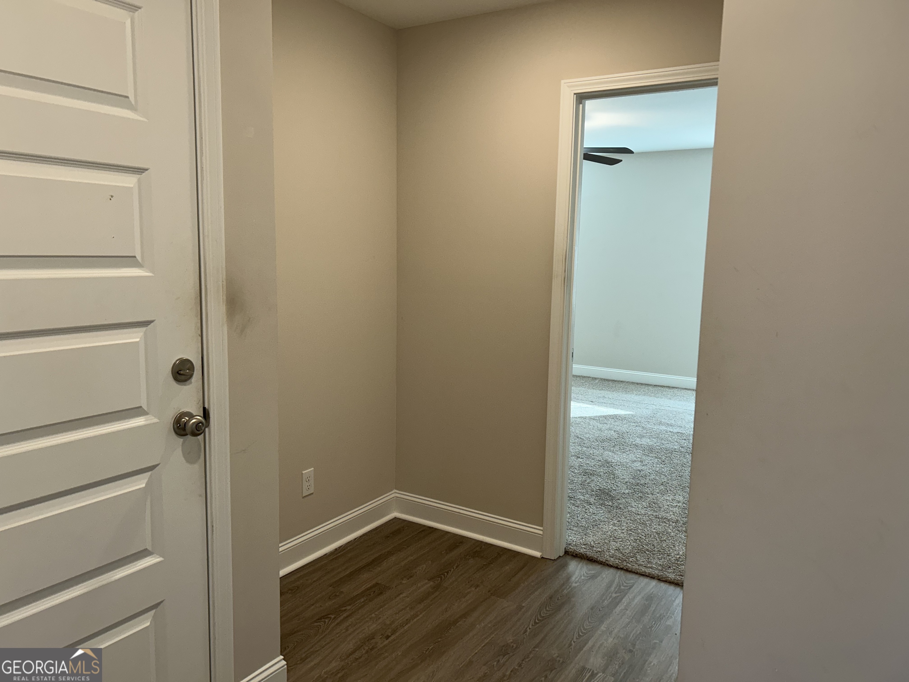 106 Old Barn Road Statesboro, GA 30458 - Photo 26 of 59 a view of a hallway with wooden floor