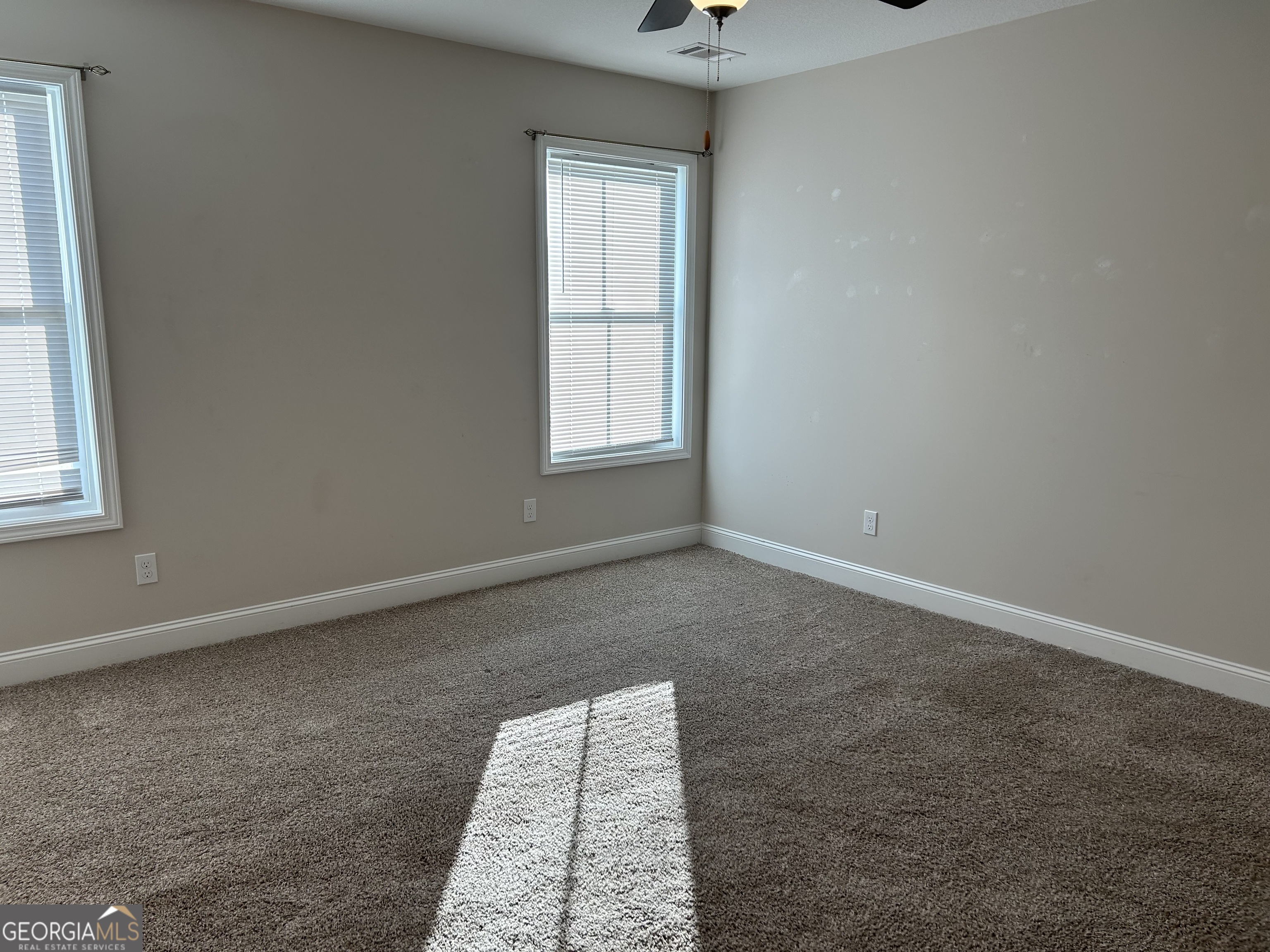 106 Old Barn Road Statesboro, GA 30458 - Photo 30 of 59 an empty room with a window
