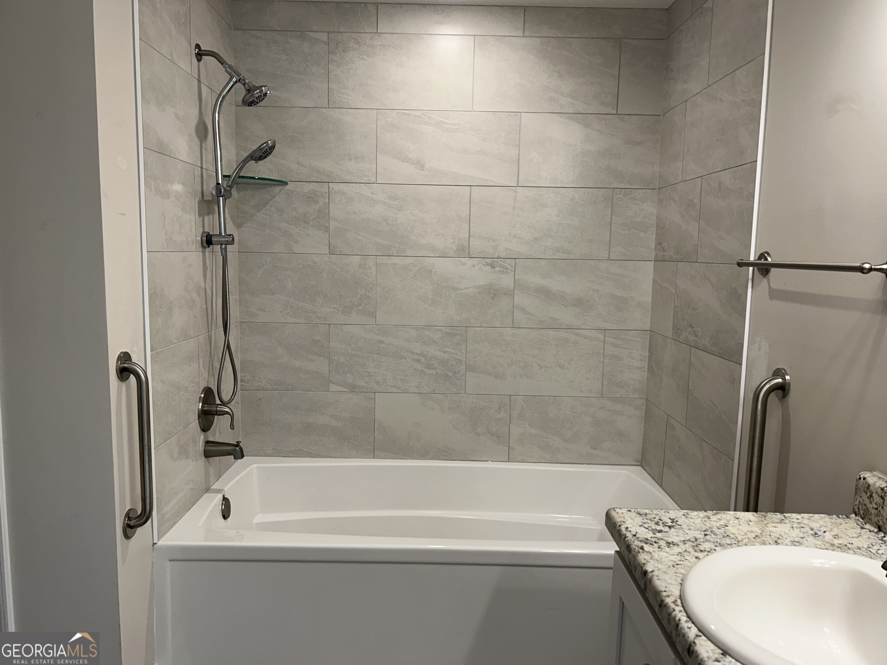 106 Old Barn Road Statesboro, GA 30458 - Photo 32 of 59 a bathroom with a granite countertop bathtub shower and toilet