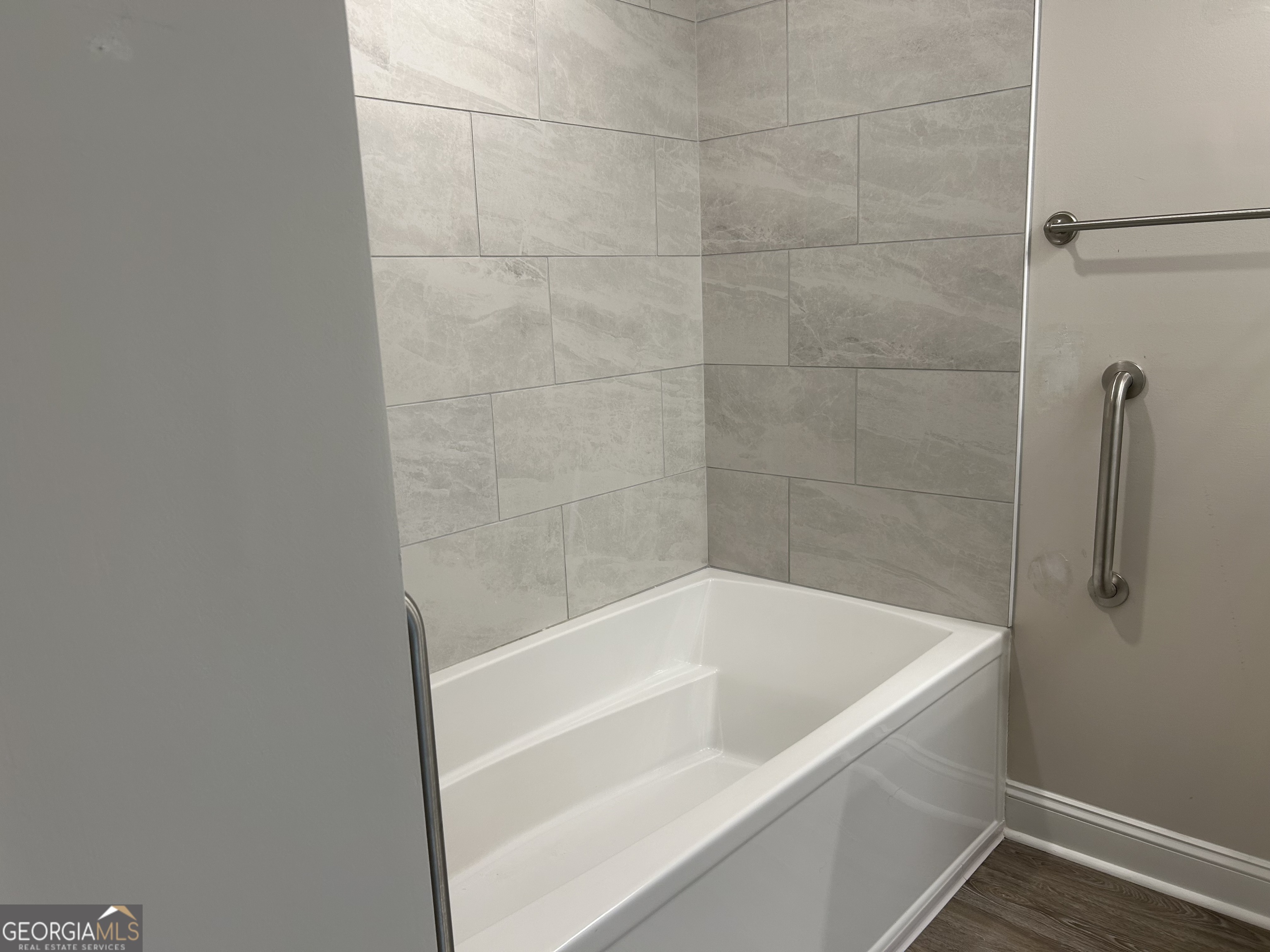 106 Old Barn Road Statesboro, GA 30458 - Photo 33 of 59 a white bath tub and shower