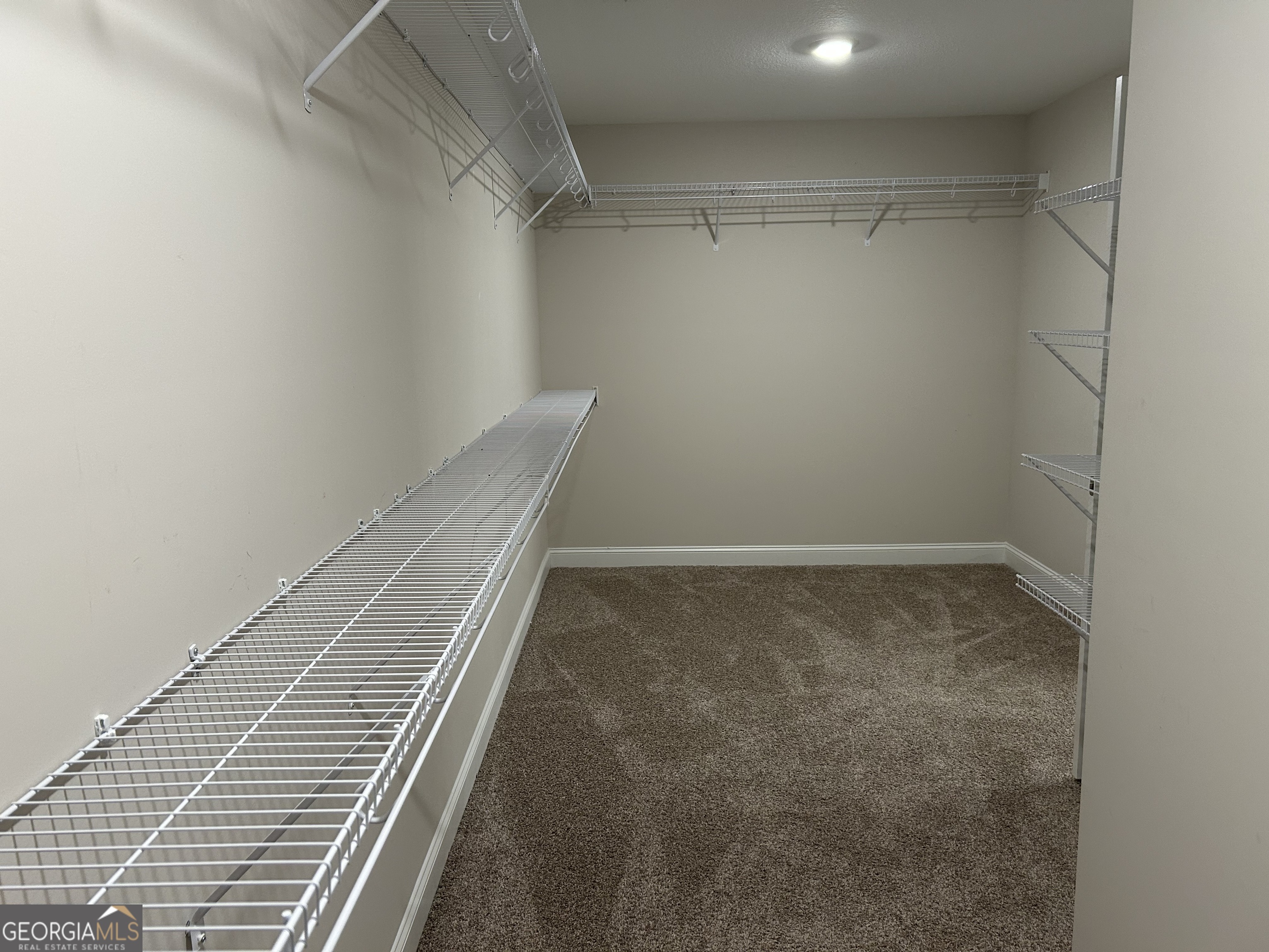 106 Old Barn Road Statesboro, GA 30458 - Photo 39 of 59 a view of a room with empty racks