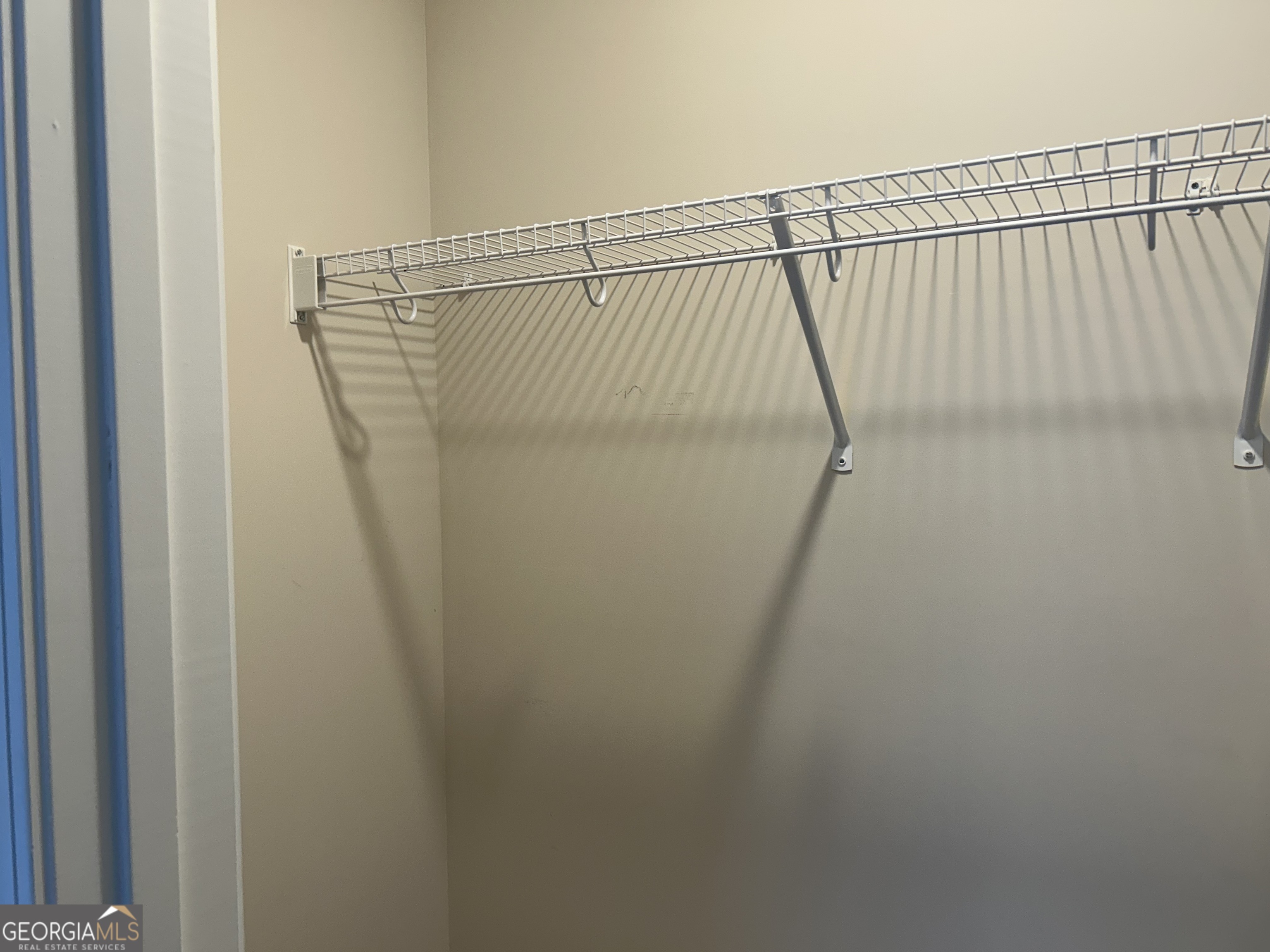 106 Old Barn Road Statesboro, GA 30458 - Photo 44 of 59 a close up view of a white wall with wooden floor