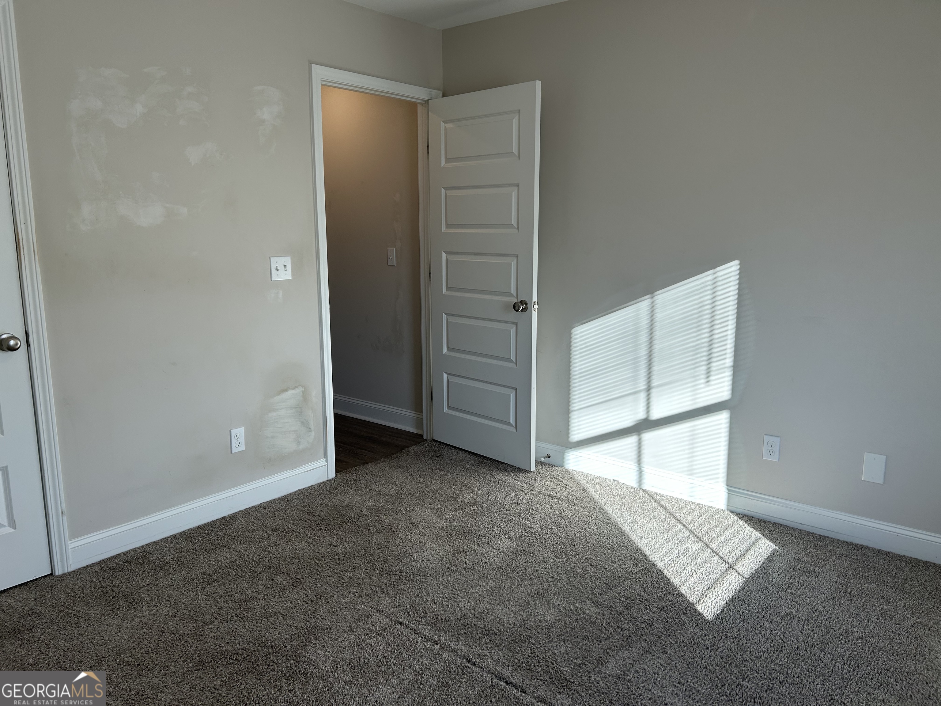 106 Old Barn Road Statesboro, GA 30458 - Photo 46 of 59 an empty room with windows and closet
