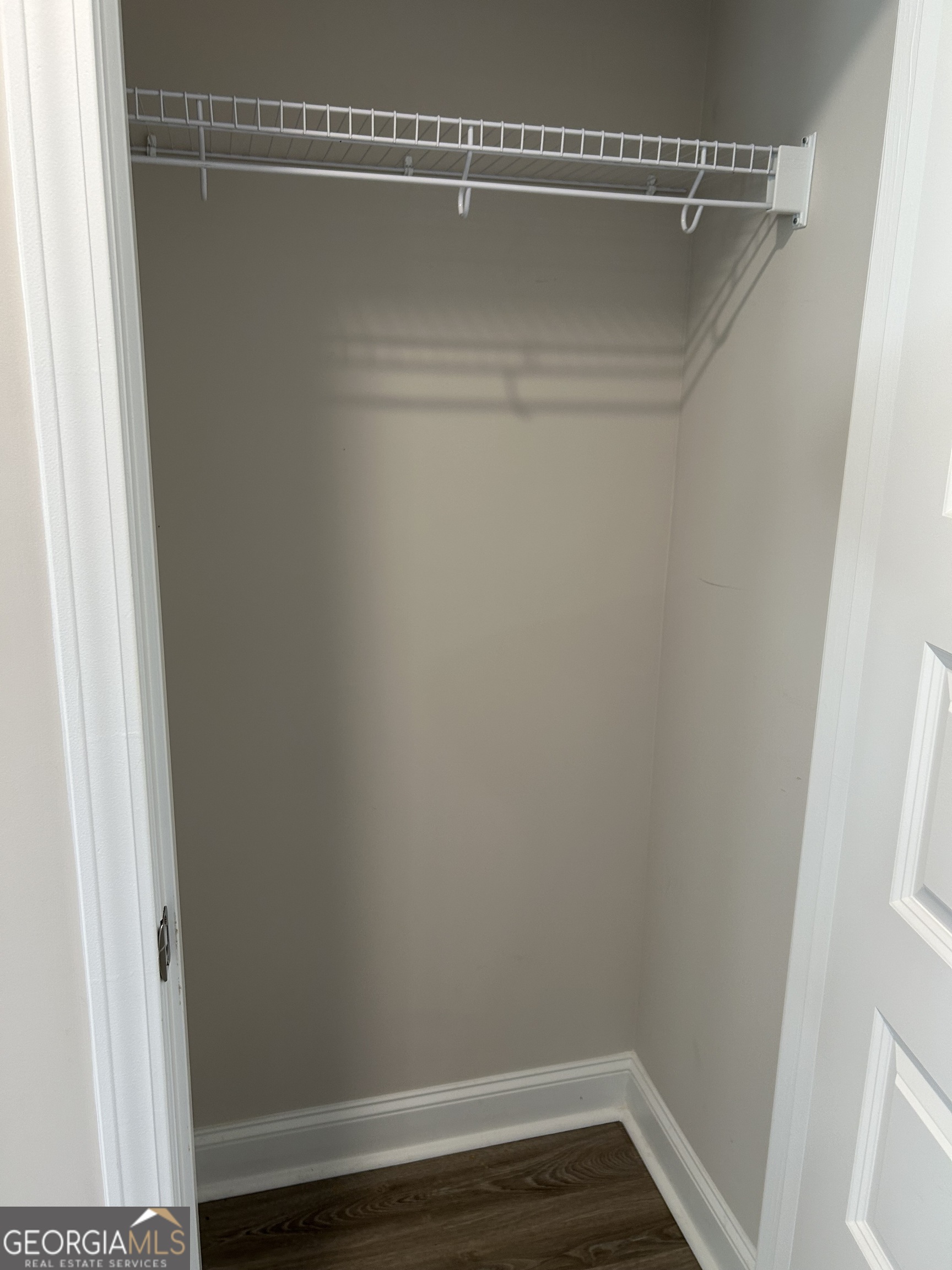 106 Old Barn Road Statesboro, GA 30458 - Photo 49 of 59 a view of a closet with wooden floor