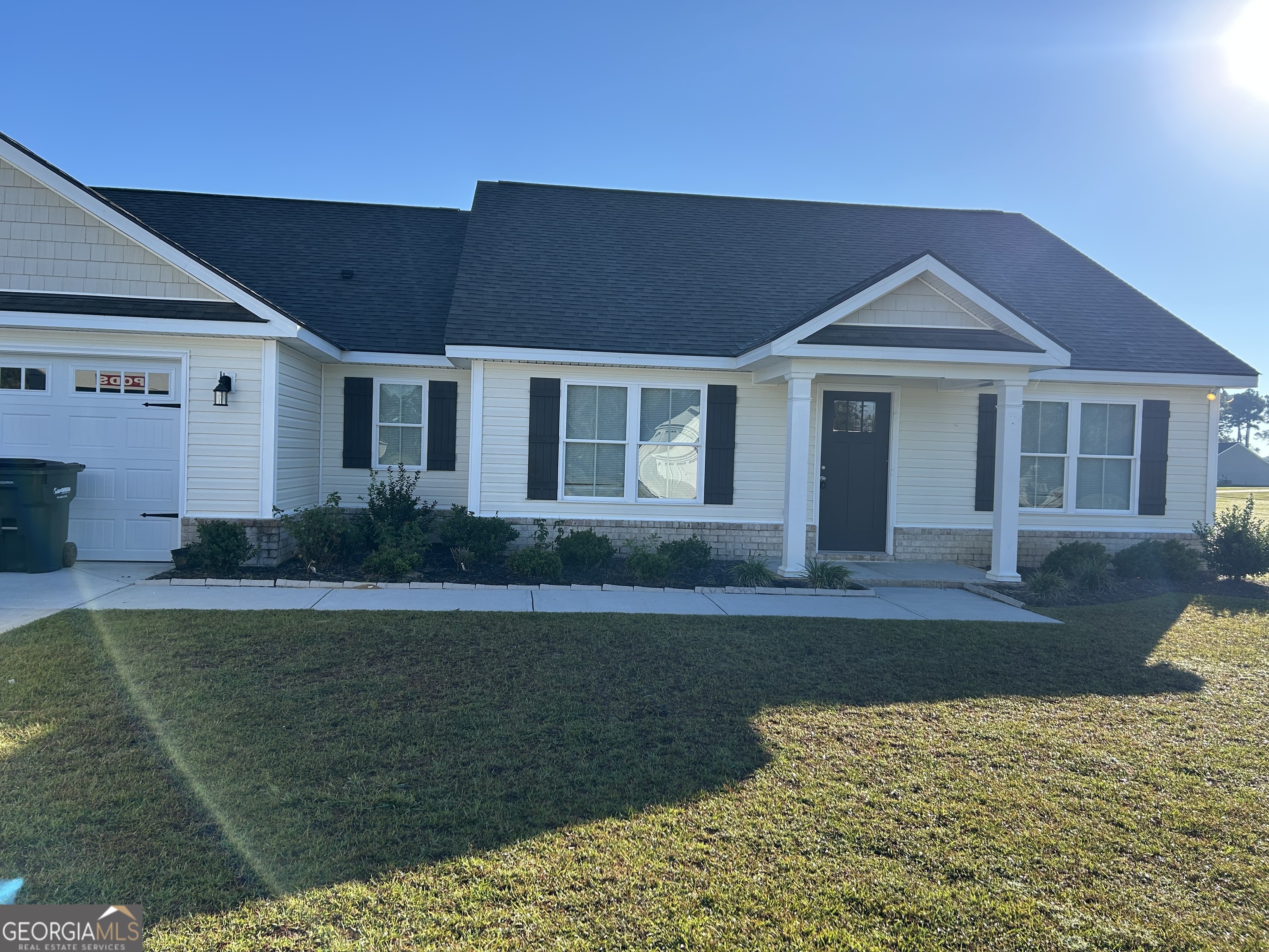 106 Old Barn Road Statesboro, GA 30458 - Photo 5 of 59 a front view of a house with garden