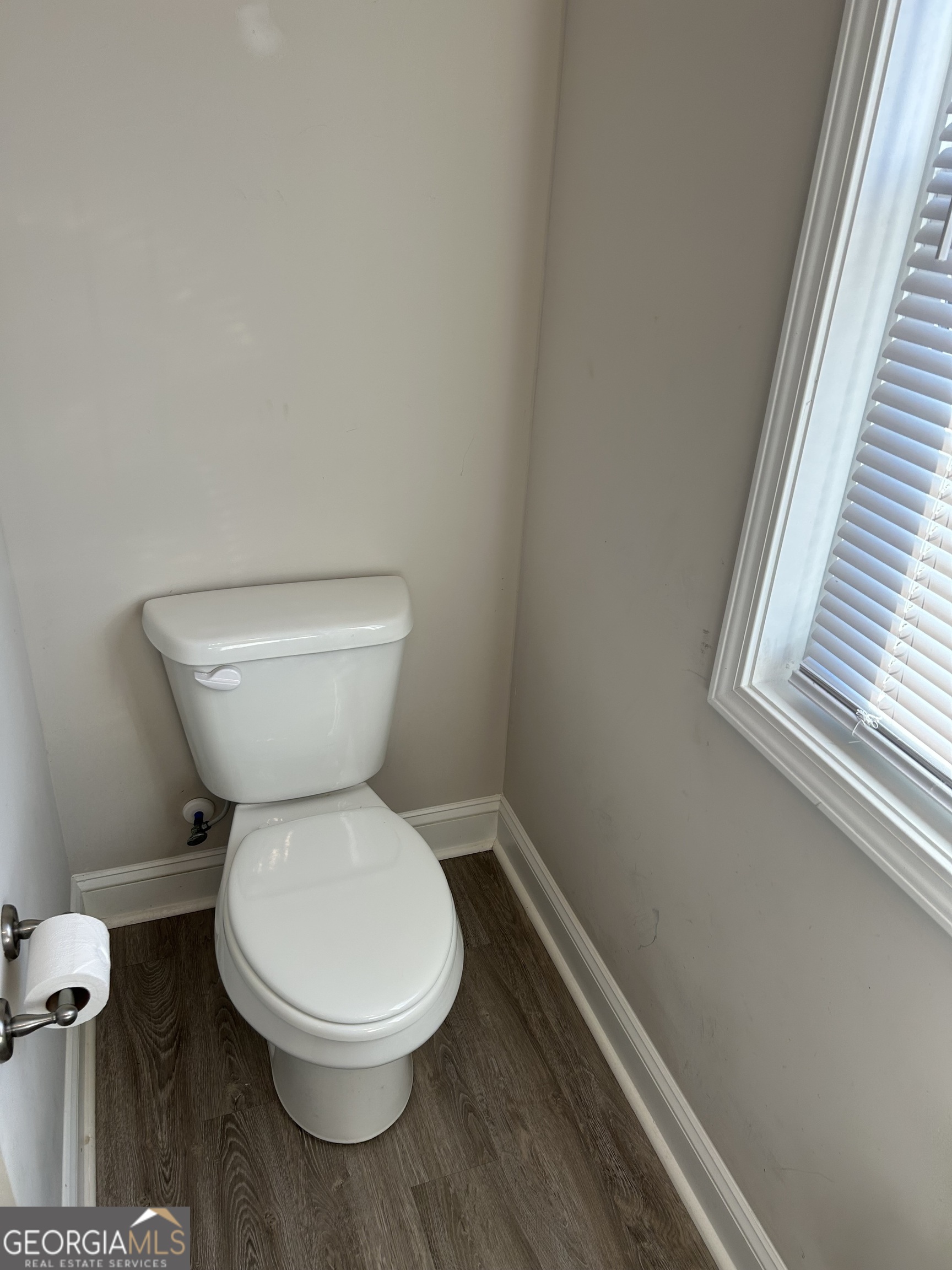 106 Old Barn Road Statesboro, GA 30458 - Photo 53 of 59 a white toilet sitting next to a window