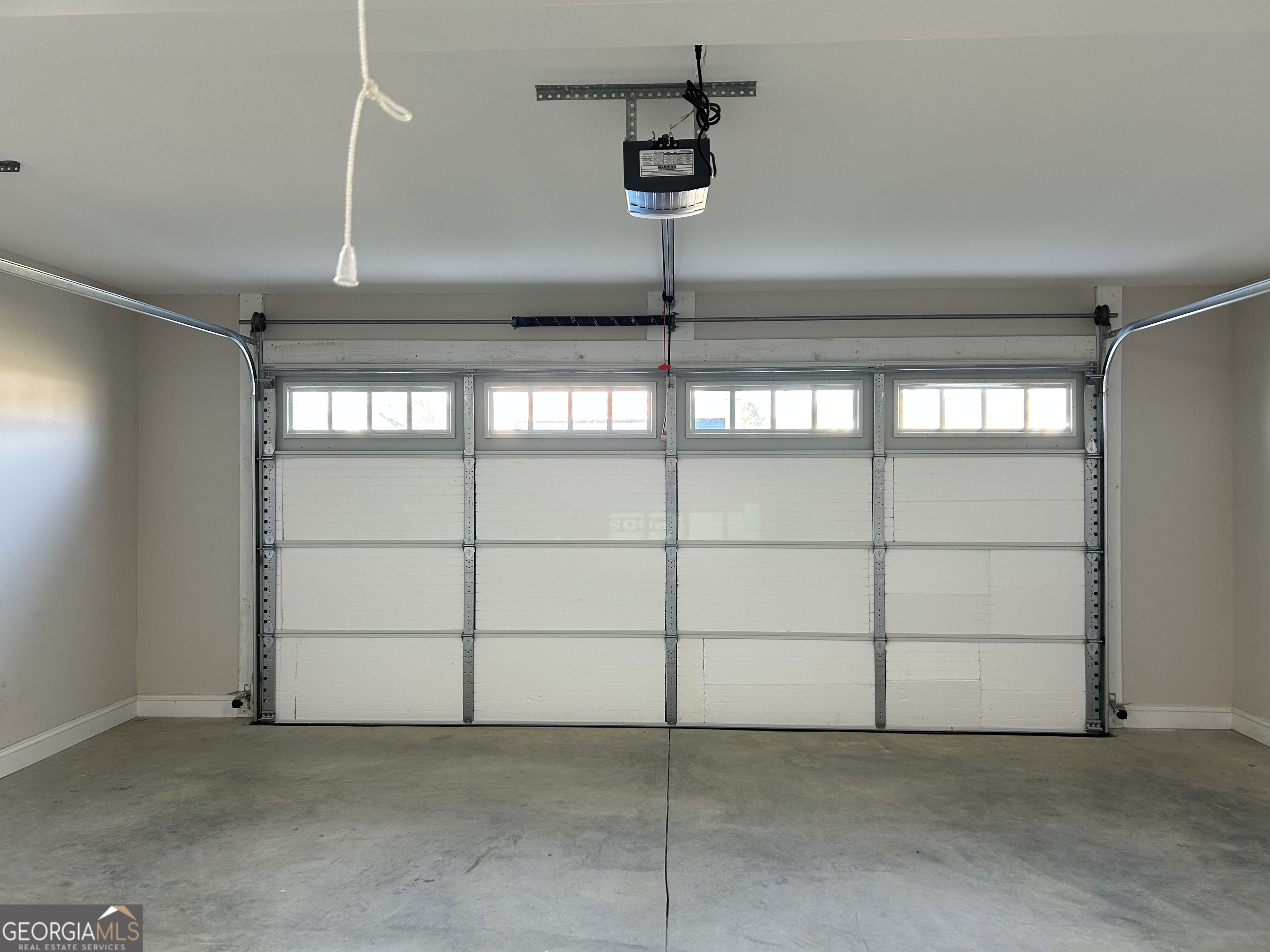 106 Old Barn Road Statesboro, GA 30458 - Photo 59 of 59 a view of a room with racks on the wall