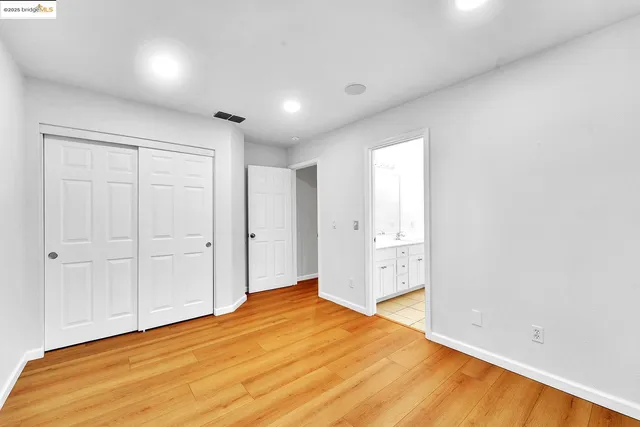 a view of a hallway with washer and dryer