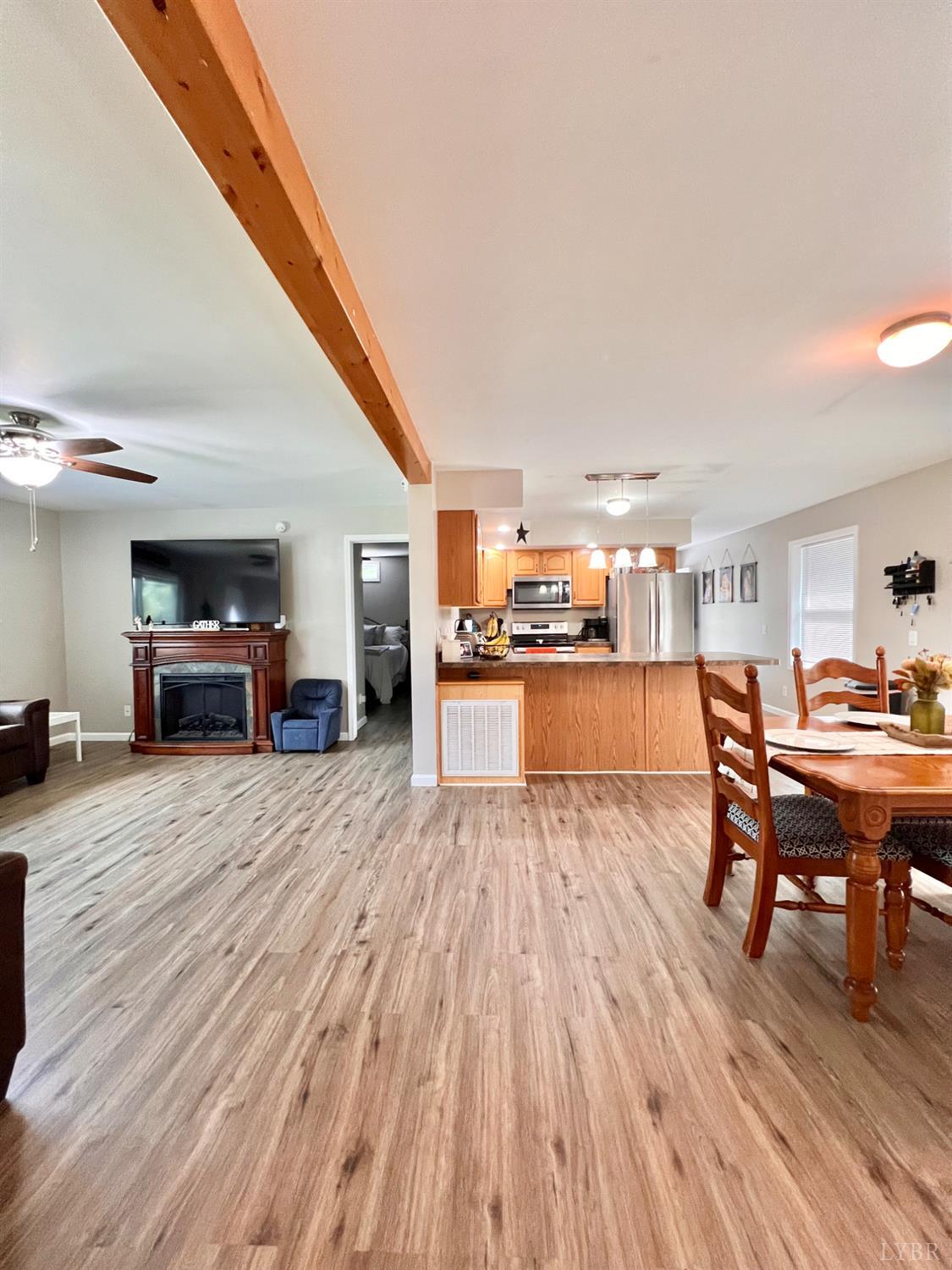 102 Fawn Court Amherst, VA 24521 - Photo 26 of 64 a living room with furniture and a wooden floor