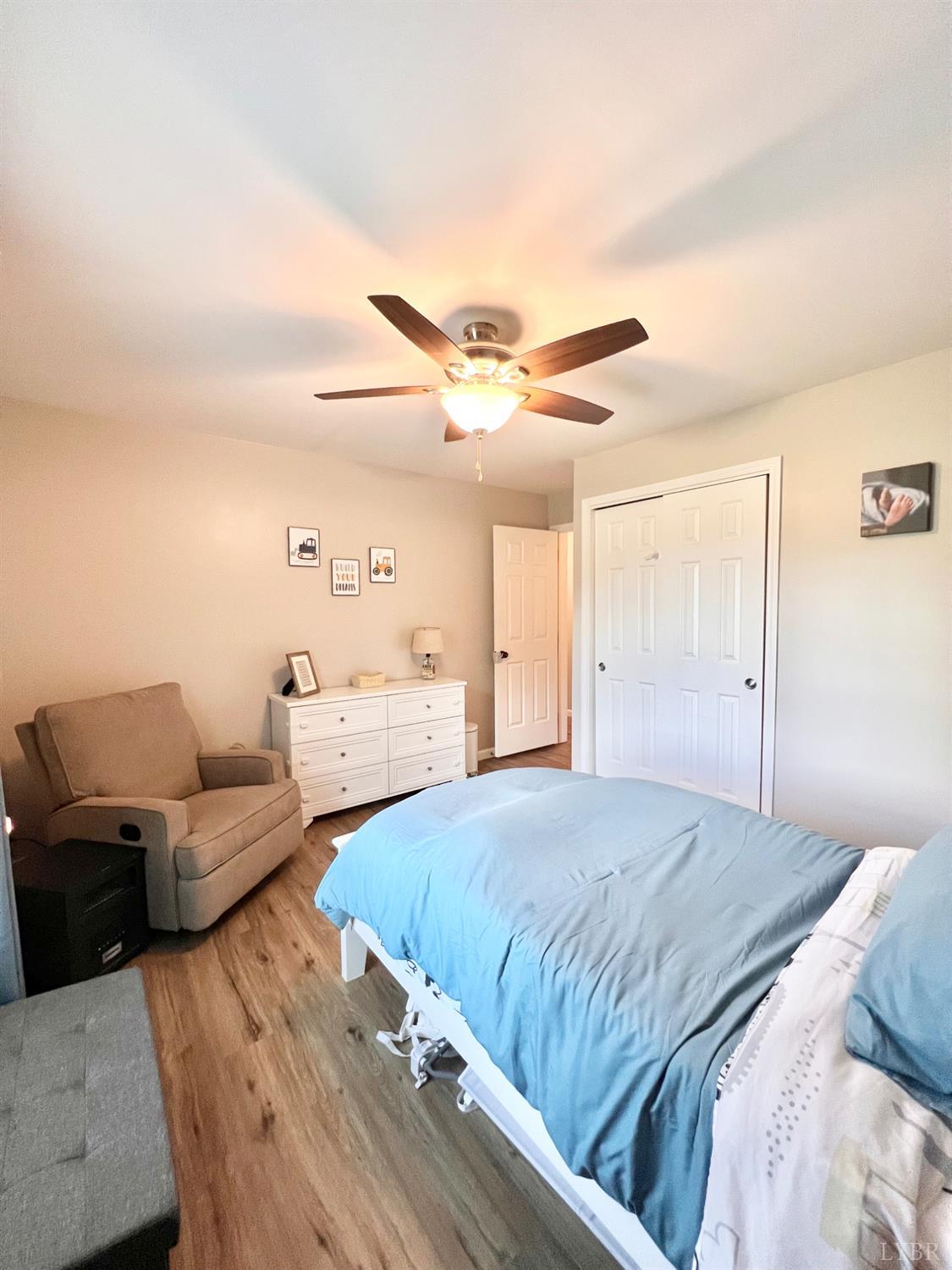 102 Fawn Court Amherst, VA 24521 - Photo 31 of 64 a bedroom with a bed and couch