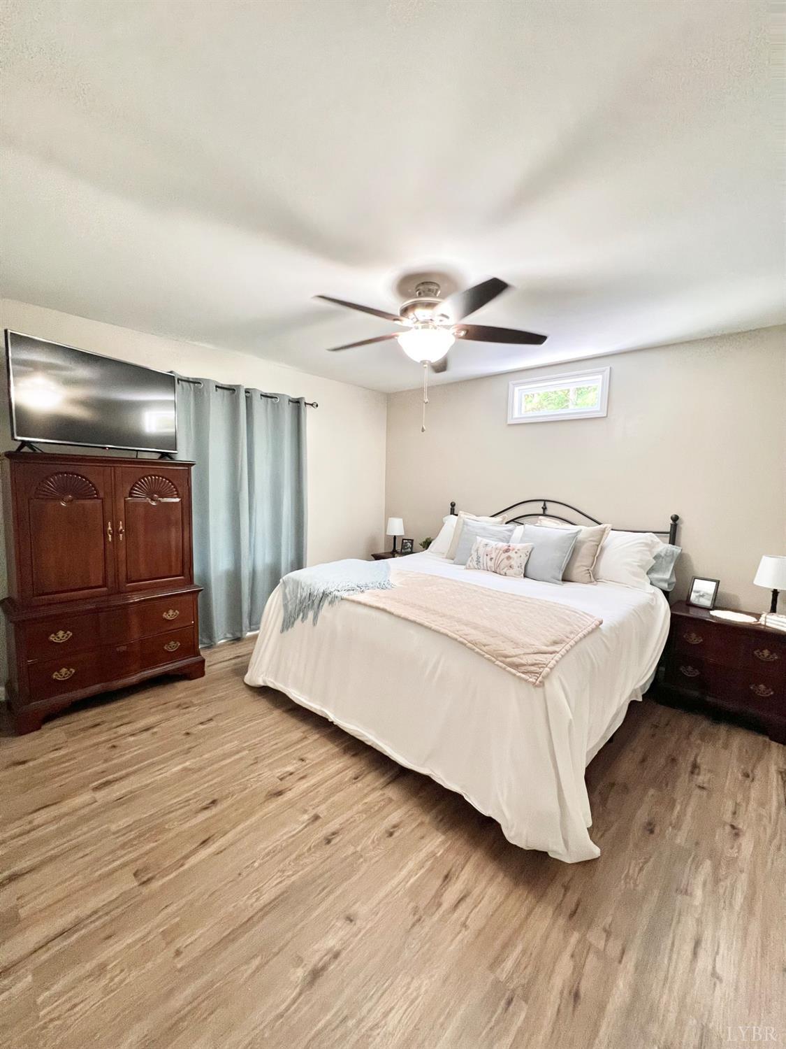 102 Fawn Court Amherst, VA 24521 - Photo 4 of 64 a bedroom with a bed and window