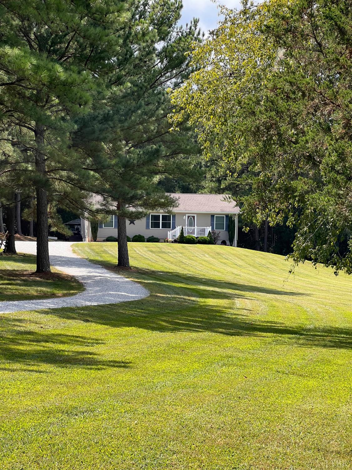 102 Fawn Court Amherst, VA 24521 - Photo 60 of 64 a view of an swimming pool with an outdoor seating