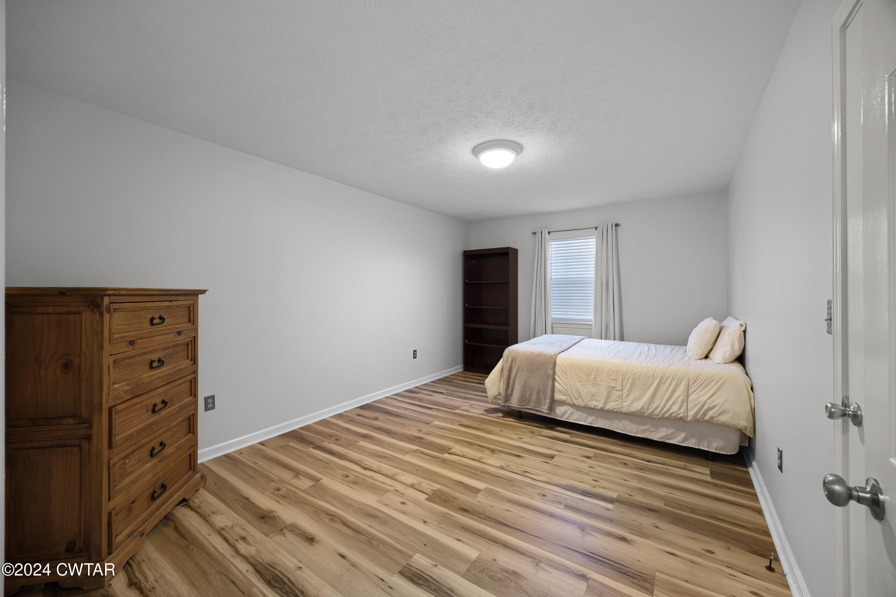 650 Gobelet Road Medon, TN 38356 - Photo 14 of 21 a bedroom with a bed and a closet