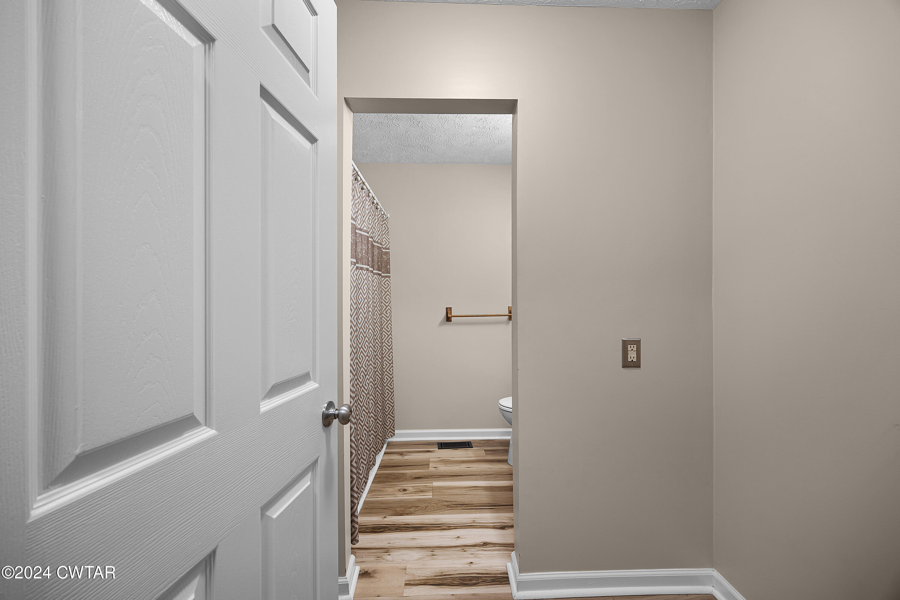 650 Gobelet Road Medon, TN 38356 - Photo 15 of 21 a view of a hallway with wooden floor and entryway
