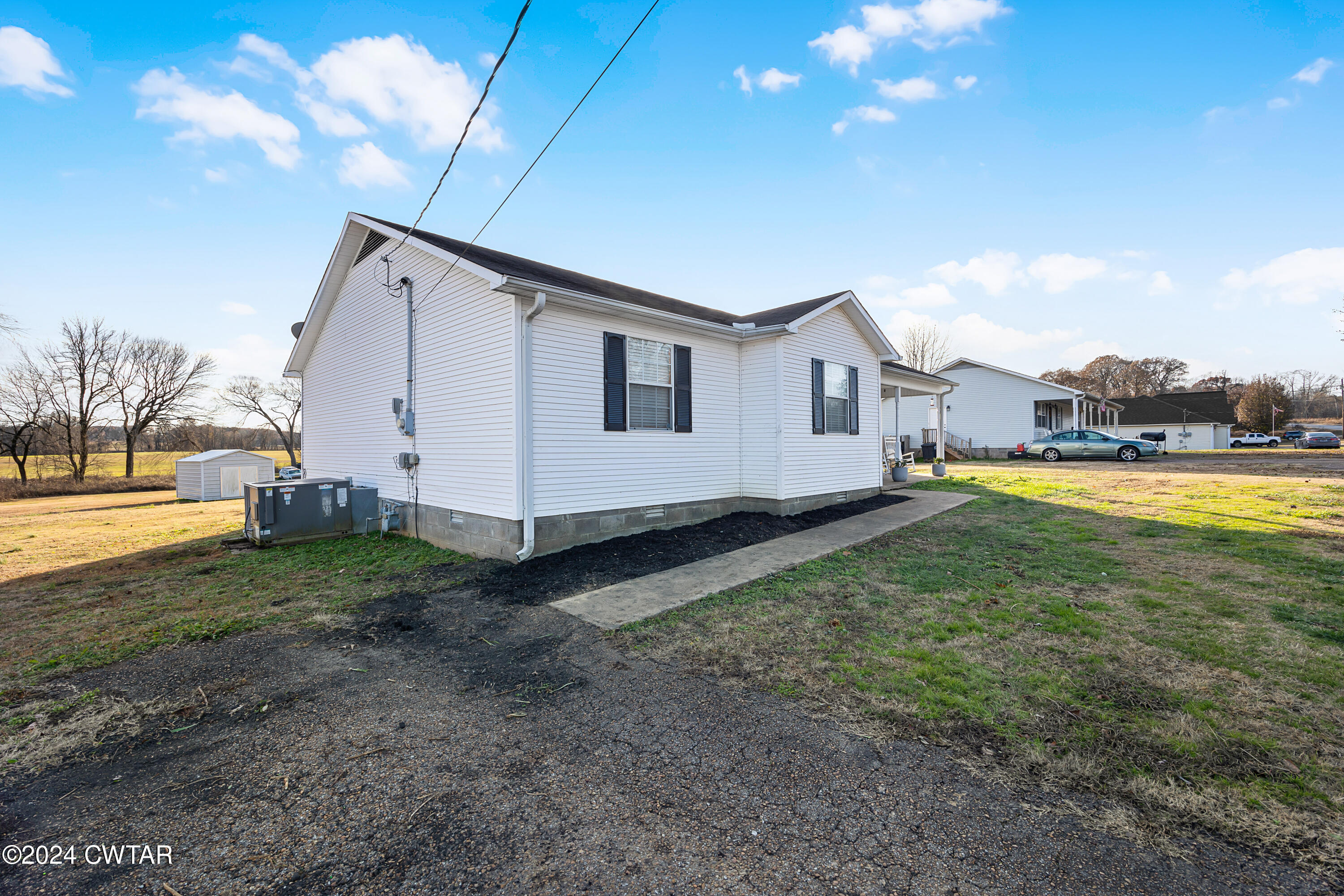 650 Gobelet Road Medon, TN 38356 - Photo 20 of 21 a view of a house with backyard and sitting area