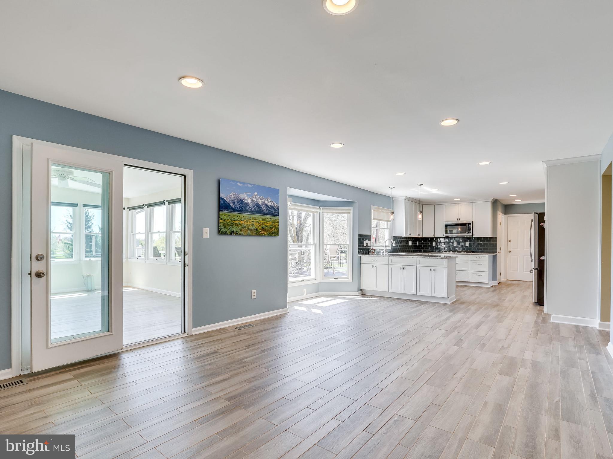 16910 Hoskinson Road Poolesville, MD 20837 - Photo 14 of 30 a view of kitchen with wooden floor