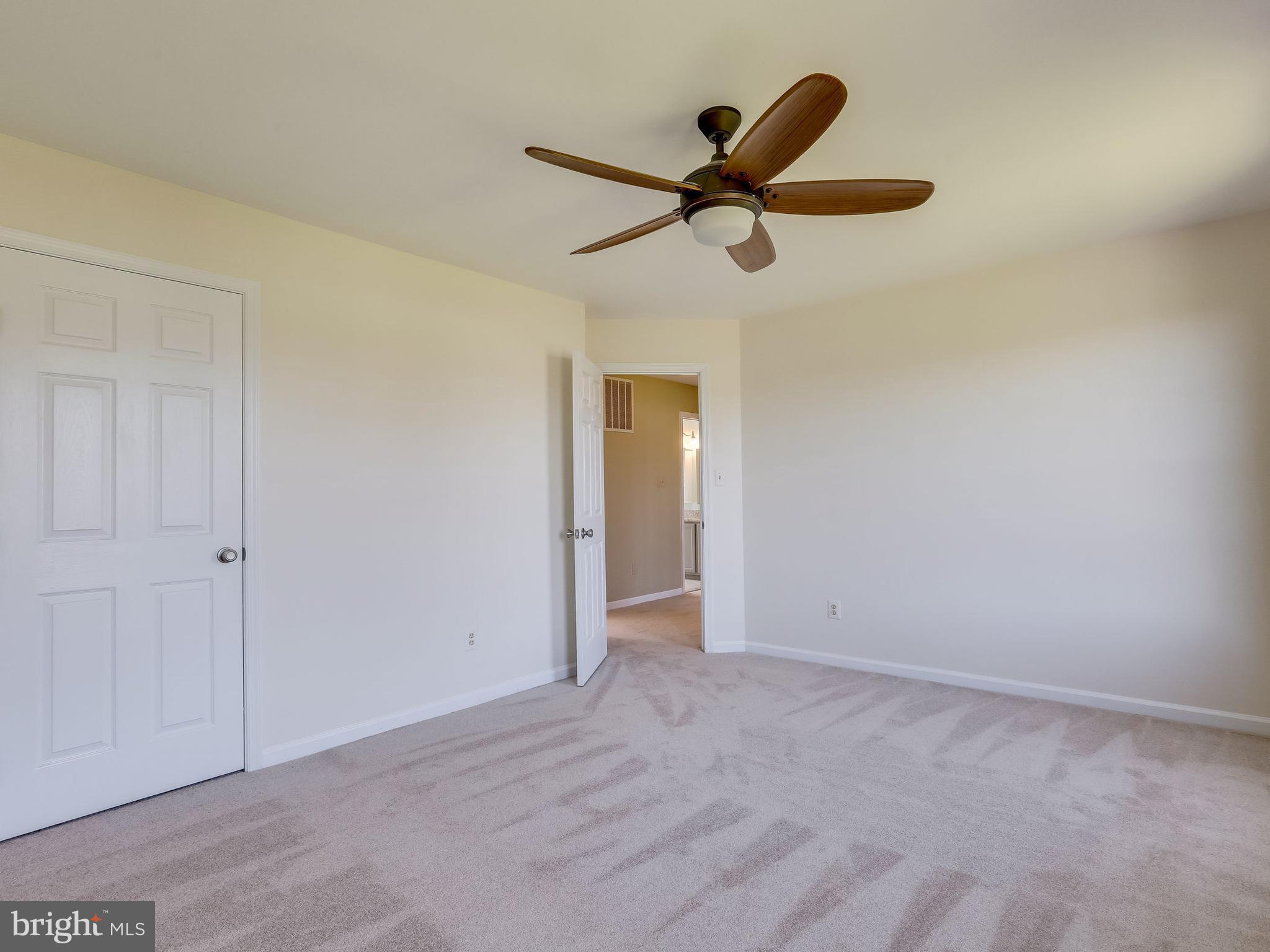 16910 Hoskinson Road Poolesville, MD 20837 - Photo 21 of 30 a view of a big room with wooden floor