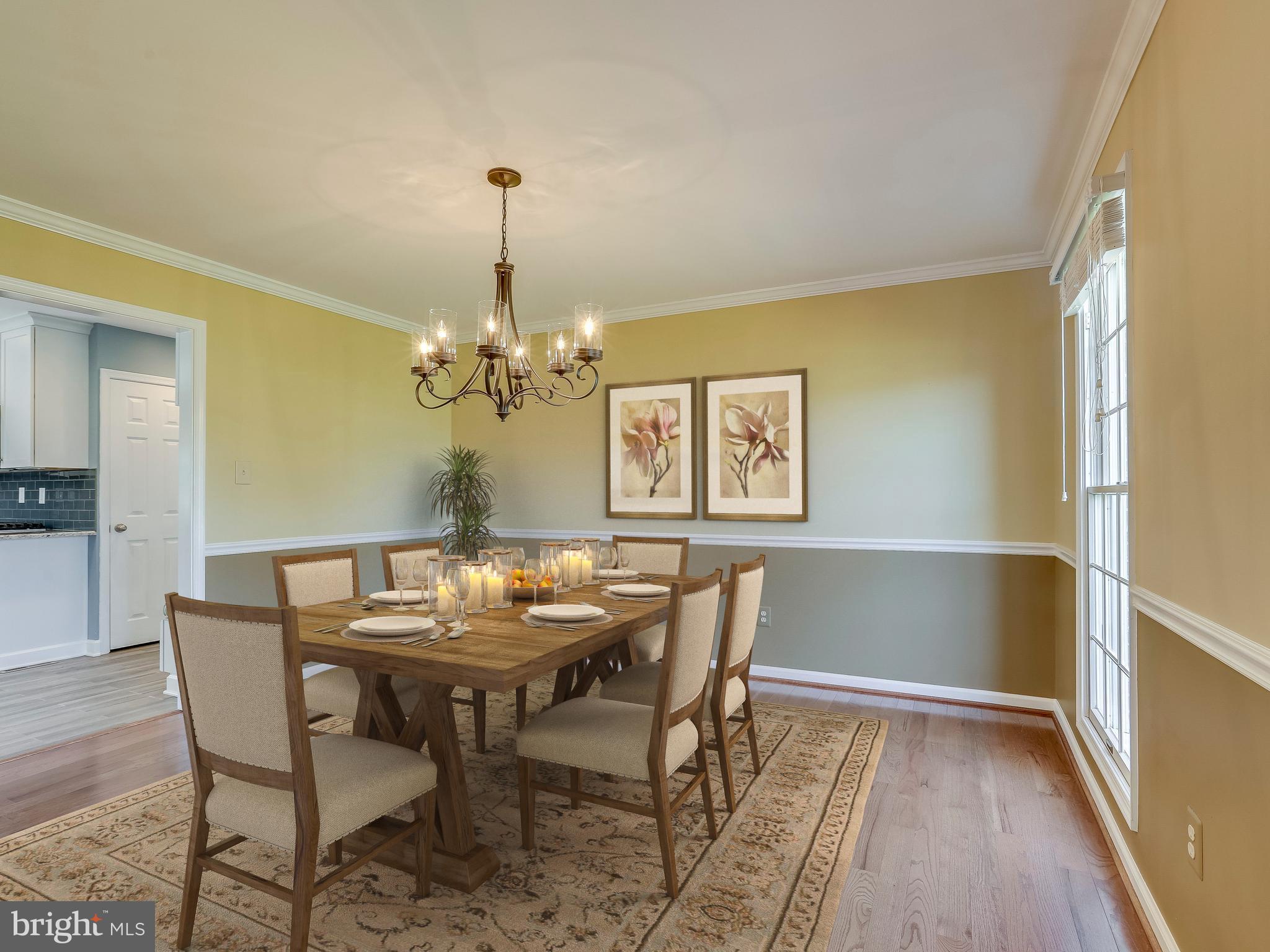 16910 Hoskinson Road Poolesville, MD 20837 - Photo 10 of 30 a view of a dining room with furniture and chandelier