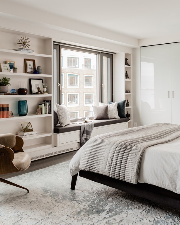 20 Rowes Wharf, Unit 610 Boston, MA 02110 - Photo 11 of 20 a bedroom with bed and a large window