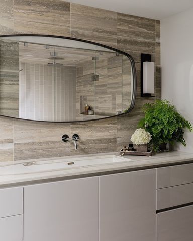 a bathroom with a sink and mirror