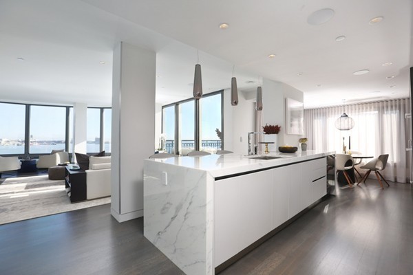 20 Rowes Wharf, Unit 610 Boston, MA 02110 - Photo 4 of 20 a kitchen with counter top space and living room