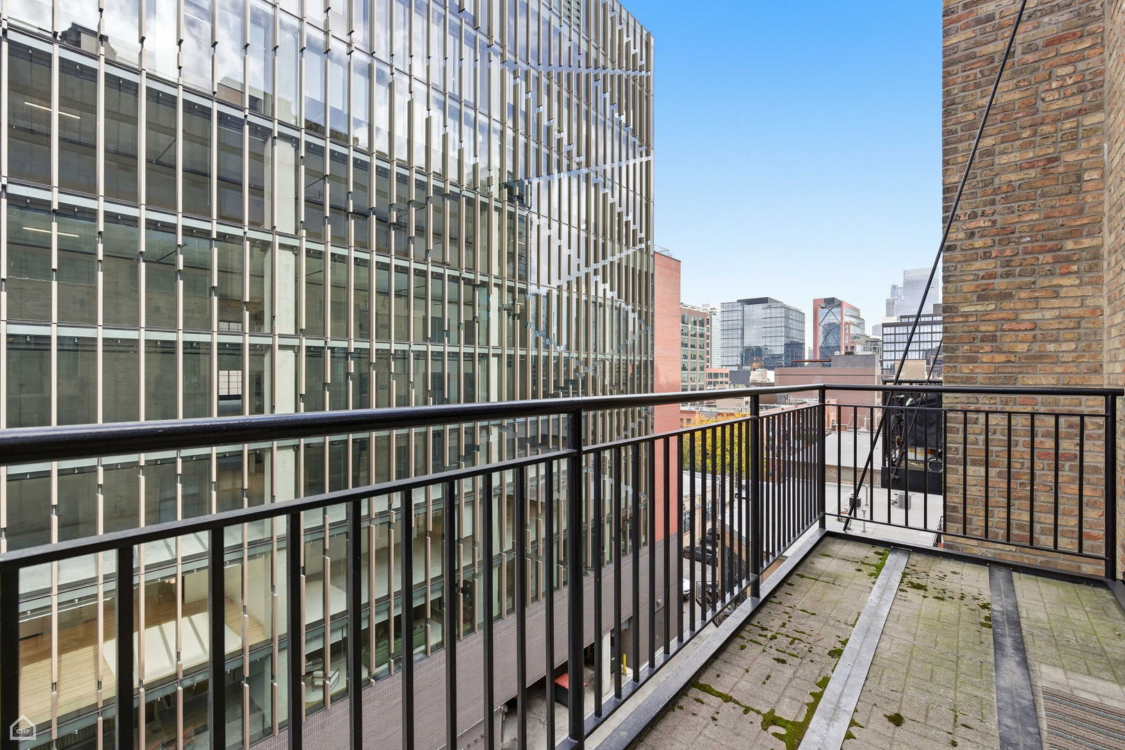 215 North Aberdeen Street, Unit 607B Chicago, IL 60607 - Photo 11 of 12 a view of city from balcony