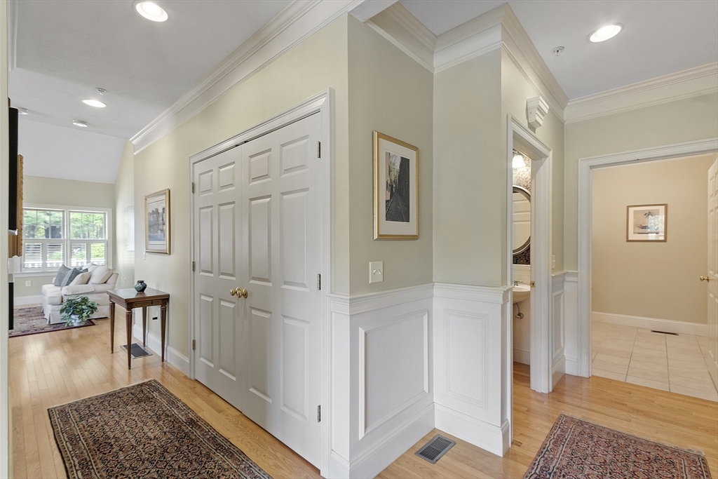 22 Hummock Way, Unit 22 Hudson, MA 01749 - Photo 21 of 23 a view of entryway with wooden floor and a rug
