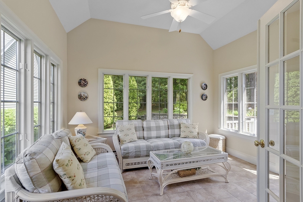 22 Hummock Way, Unit 22 Hudson, MA 01749 - Photo 9 of 23 a living room with furniture and a large window