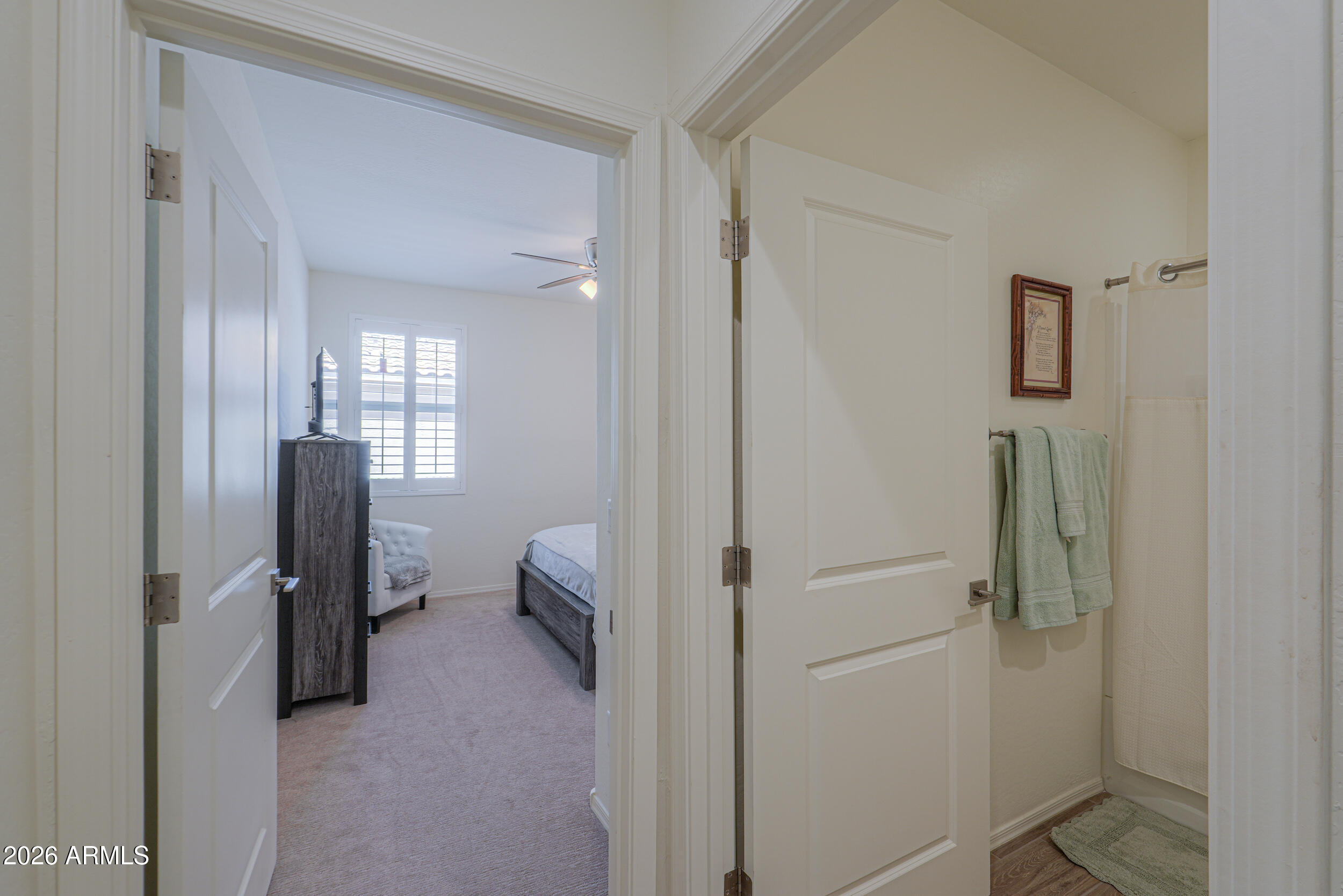 42085 West Cribbage Road Maricopa, AZ 85138 - Photo 15 of 35 a view of a hallway with bathroom and a closet