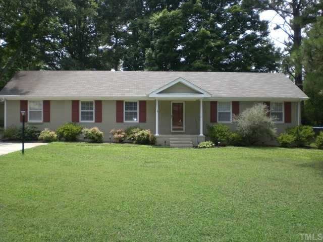 3113 Sherry Drive Raleigh, NC 27604 - Photo 1 of 12 a front view of a house with a garden