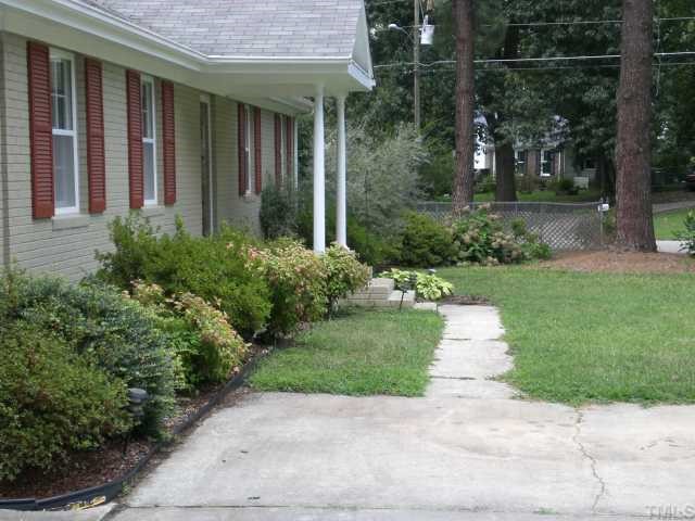 3113 Sherry Drive Raleigh, NC 27604 - Photo 11 of 12 a view of a house with garden