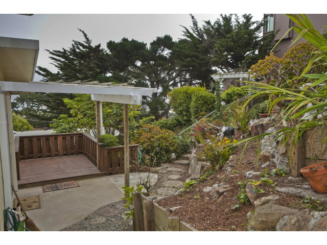 128 Kent Road Pacifica, CA 94044 - Photo 5 of 24 a view of a backyard