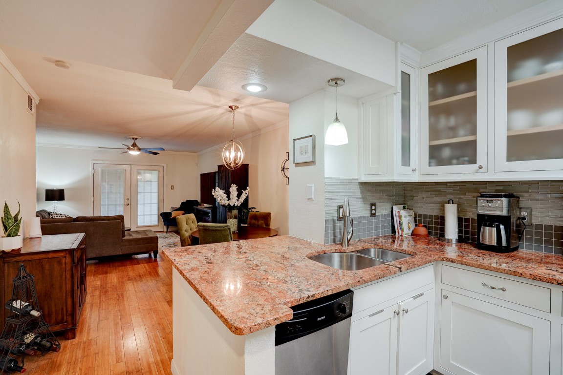 7920 Rockwood Lane, Unit 128 Austin, TX 78757 - Photo 11 of 36 a kitchen with counter space cabinets and appliances