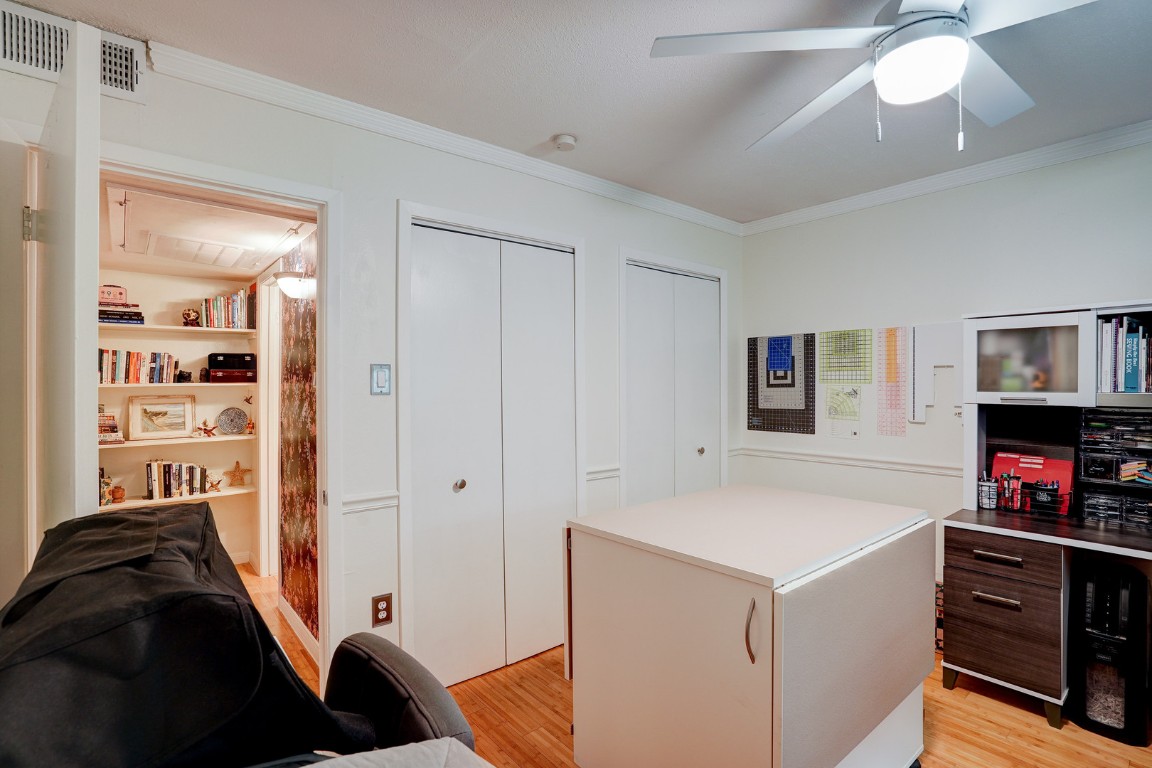 7920 Rockwood Lane, Unit 128 Austin, TX 78757 - Photo 21 of 36 a view of a livingroom with furniture and toys