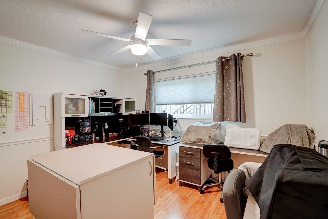 7920 Rockwood Lane, Unit 128 Austin, TX 78757 - Photo 22 of 36 a view of a workspace with furniture and a window